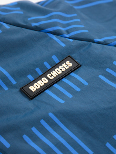 Almost Moiré all over reversible anorak