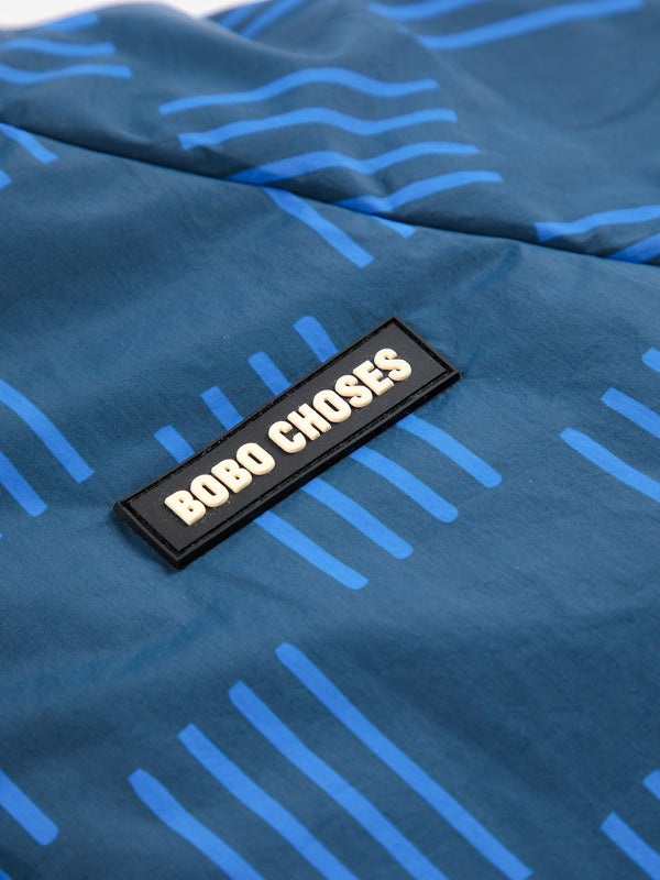 Almost Moiré all over reversible anorak