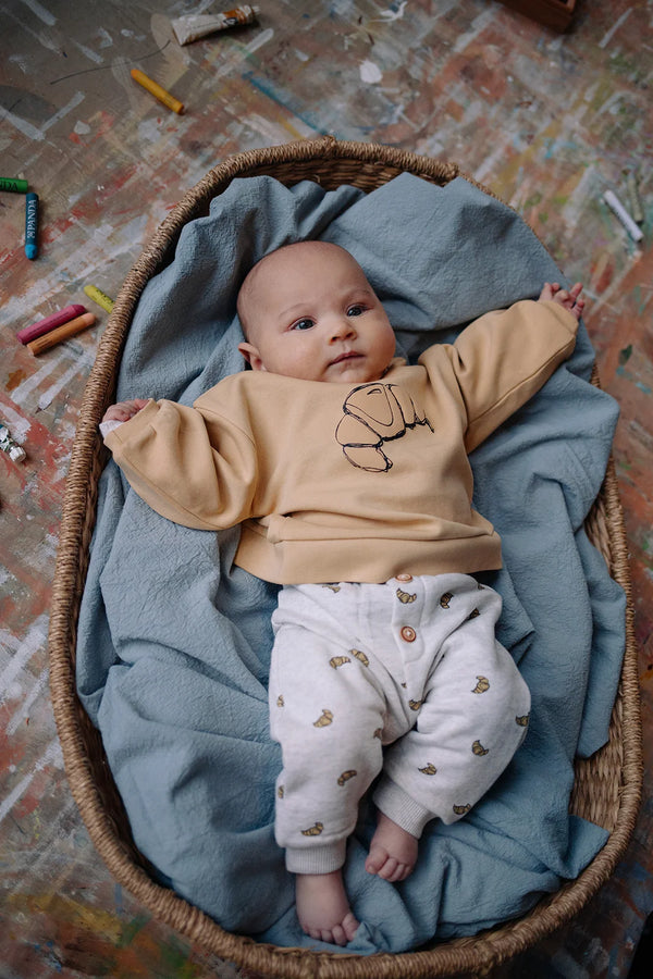 Baby sweatpants croissant print